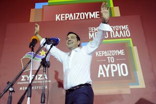 Former Greek prime minister and leader of leftist Syriza party Alexis Tsipras waves to supporters after winning the general elec