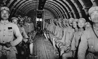 1024px-NRA_soldiers_onboard_DC3