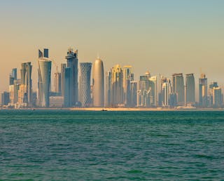 1116px-Doha_skyline_in_the_morning_(12544910974)