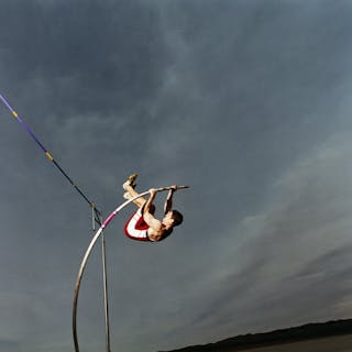 Man Pole Vaulting