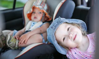 happy kids in the car in summer