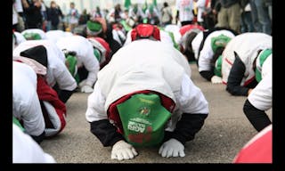 Korean protesters - march from Victoria Park to the Convention Center area by taking three steps, then prostrating, the entire w