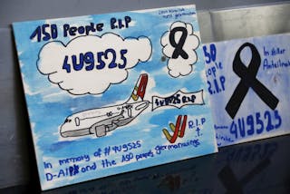 Drawings in commemoration of the 150 victims of Germanwings flight 4U9525, which crashed last week in the French Alps, are pictu