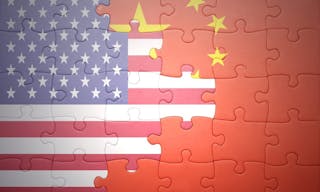 puzzle with the national flag of united states of america and china .concept