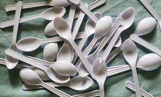 Many small plastic spoon