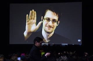 Former U.S. National Security Agency contractor Edward Snowden appears live via video during a student organized world affairs c