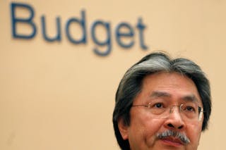 Hong Kong's Financial Secretary John Tsang speaks during a news conference after unveiling the annual budget report in Hong Kong