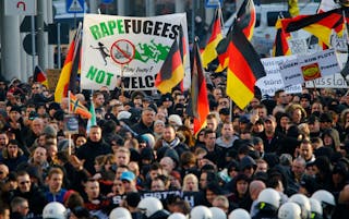 Supporters of anti-immigration right-wing movement PEGIDA protest in Cologne