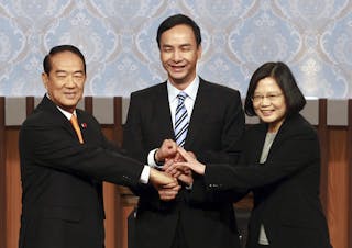 PFP Chairperson and presidential candidate James Soong shakes hands with DPP Chairperson and presidential candidate Tsai Ing-wen