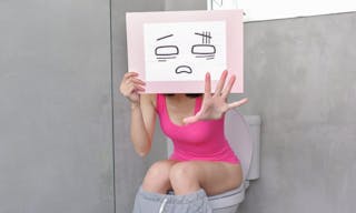 便秘 woman take confuse billboard with constipation in the toilet