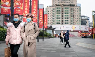 CHINA,CHENGDU,Chunxi Rd.-JANUARY 23,2020: Coronavirus epidemic in China .People wearing face masks. Novel coronavirus (2019-nCoV