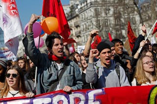 French high school and university students take part in a demonstration against the labour reform bill proposal in Paris