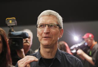 Apple CEO Cook speaks in the demonstration room after the Apple event introducing the new iPad in San Francisco