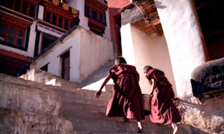 LADAKH - OCT 10: Tibetan monks in a monastery on October 10 2006 in Spiti valley Ladakh, India.The Dalai Lamas are the head monk