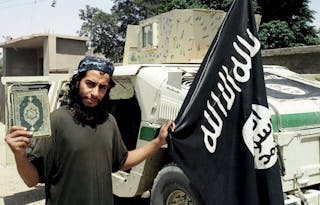 An undated photograph of a man described as Abdelhamid Abaaoud that was published in the Islamic State's online magazine Dabiq a