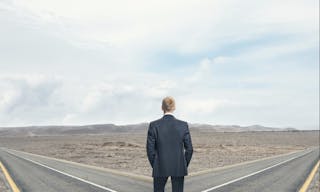 Depositphotos_29631071_l-2015 Businessman in front of two roads