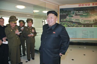 KCNA picture of North Korean leader Kim Jong Un visiting a newly-built restaurant for service personnel