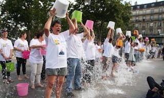 Volunteers from the ARSLA association tip buckets of ice water over their heads as they take part in an Ice Bucket Challenge in Paris on July 30, 2015. The Ice Bucket Challenge is an initiative to raise awareness and funds for Amyotrophic Lateral Sclerosis (ALS) also known as Motor Neuron Disease (MND). /SEVGI_SEVGI1132004/Credit:SEVGI/SIPA/1507311136 (Sipa via AP Images)