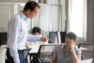 ＢＬＡＭＥ　Angry boss ceo scolding rebuking incompetent office worker intern, dissatisfied team leader shouting pointing finger at lazy employee for bad work failure, reprimand or discrimination at work concept