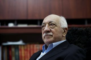 FILE  In this March 15, 2014 file photo, Turkish Muslim cleric Fethullah Gulen, sits at his residence in Saylorsburg, Pennsylvania, United States. A U.S.-based Muslim cleric, who has become Turkish President Recep Tayyip Erdogans chief foe, went on trial in absentia in Istanbul on Wednesday,  Jan. 6, 2016 accused of attempting to overthrow the government by instigating corruption probes in 2013 that targeted people close to the Turkish leader.  Gulen and 68 other people, including former police chiefs, have been charged with attempting to overthrow the Turkish republic through the use of violence, leading a terrorist organization and "political espionage." Prosecutors are seeking life imprisonment for Gulen and others. (AP Photo/Selahattin Sevi, File)