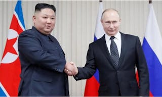 _133454434_putin_kim