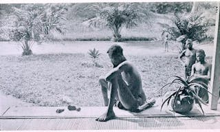 Nsala of Wala in Congo looks at the severed hand and foot of his five-year old daughter, 1904