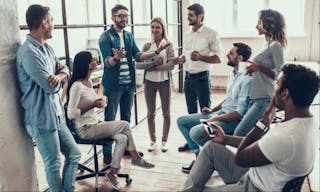 Group of Young Business People on Break in Office. Successful Business Team Talking on Coffee Break. Young Smiling Colleagues on