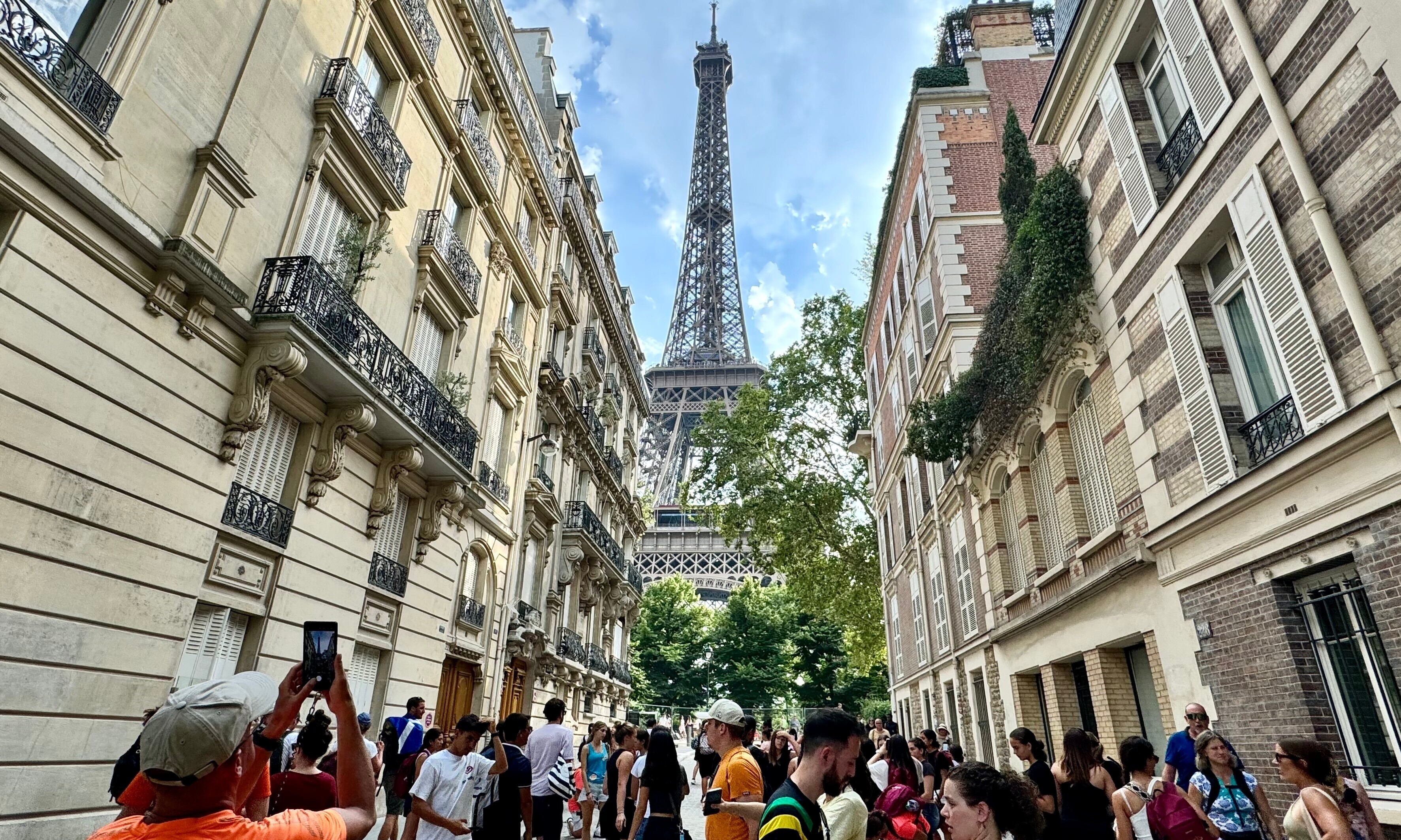 Paris tourist taking photo of Eiffel Tower