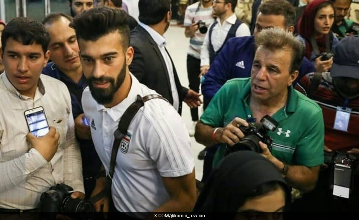 Iranian Footballer Faces Questioning Over Controversial 'Hug' With Female Fan