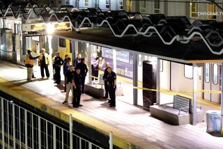 Police investigate the scene of a shooting at the Metro Rain La Cienega/Jefferson station on Friday, June 21, 2024.