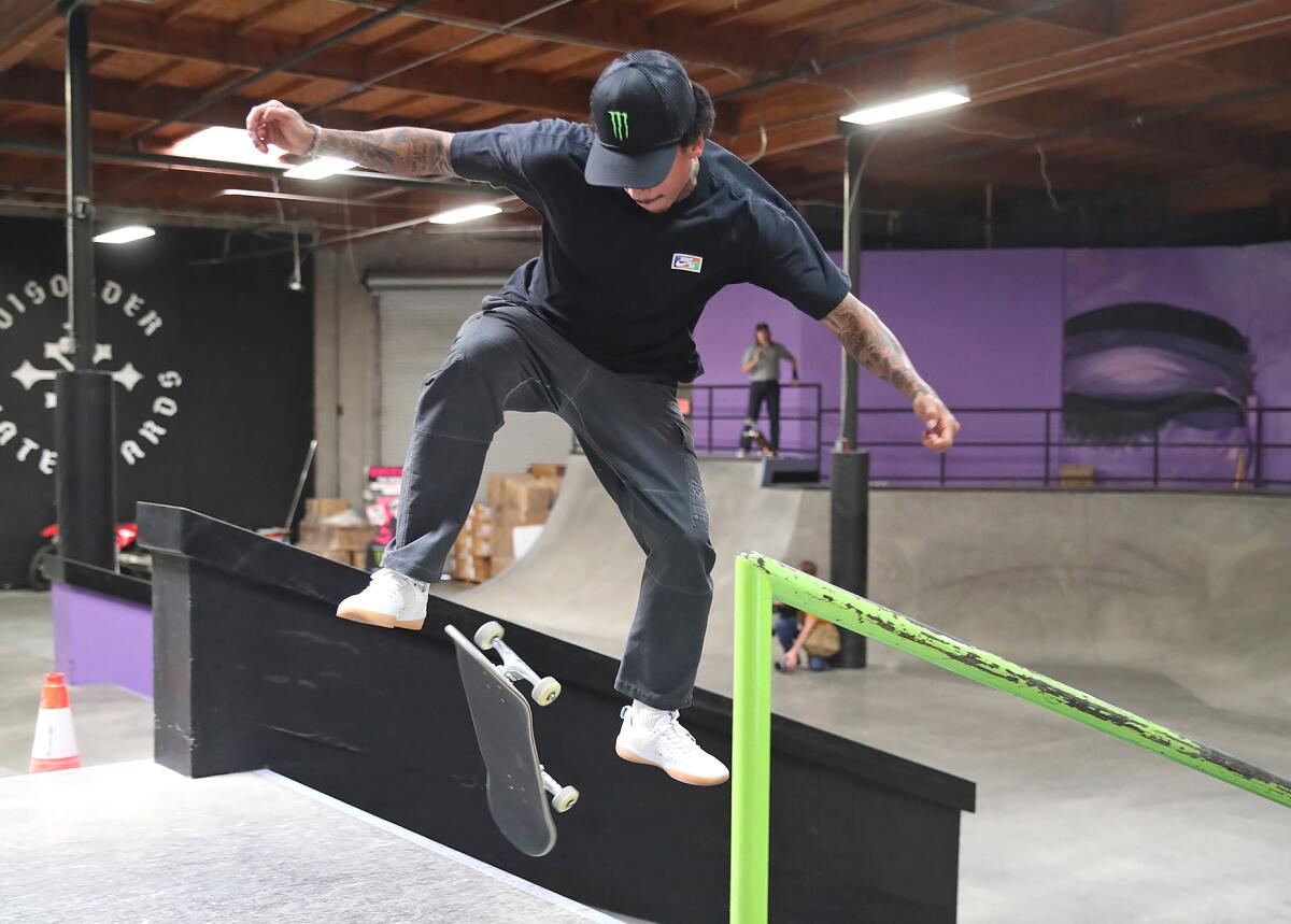 Pro skateboarder Nyjah Huston practices at his skate park in San Clemente.