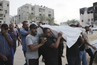 Palestinians carry a person killed by Israeli bombardment to their burial in Khan Younis, southern Gaza Strip, Friday, June 21, 2024. (AP Photo /Jehad Alshrafi)