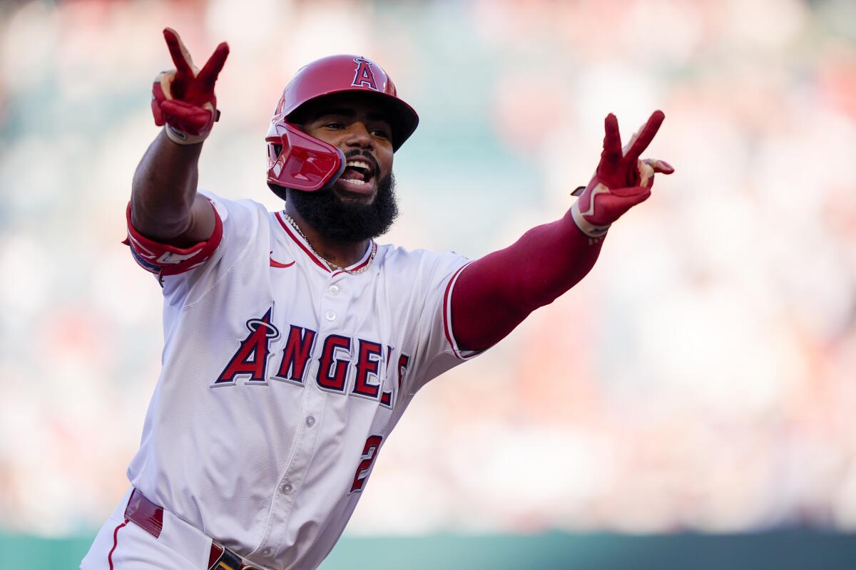 Luis Rengifo celebrates after hitting a two-run home run during a 5-2 win over the Detroit Tigers at Angel Stadium.
