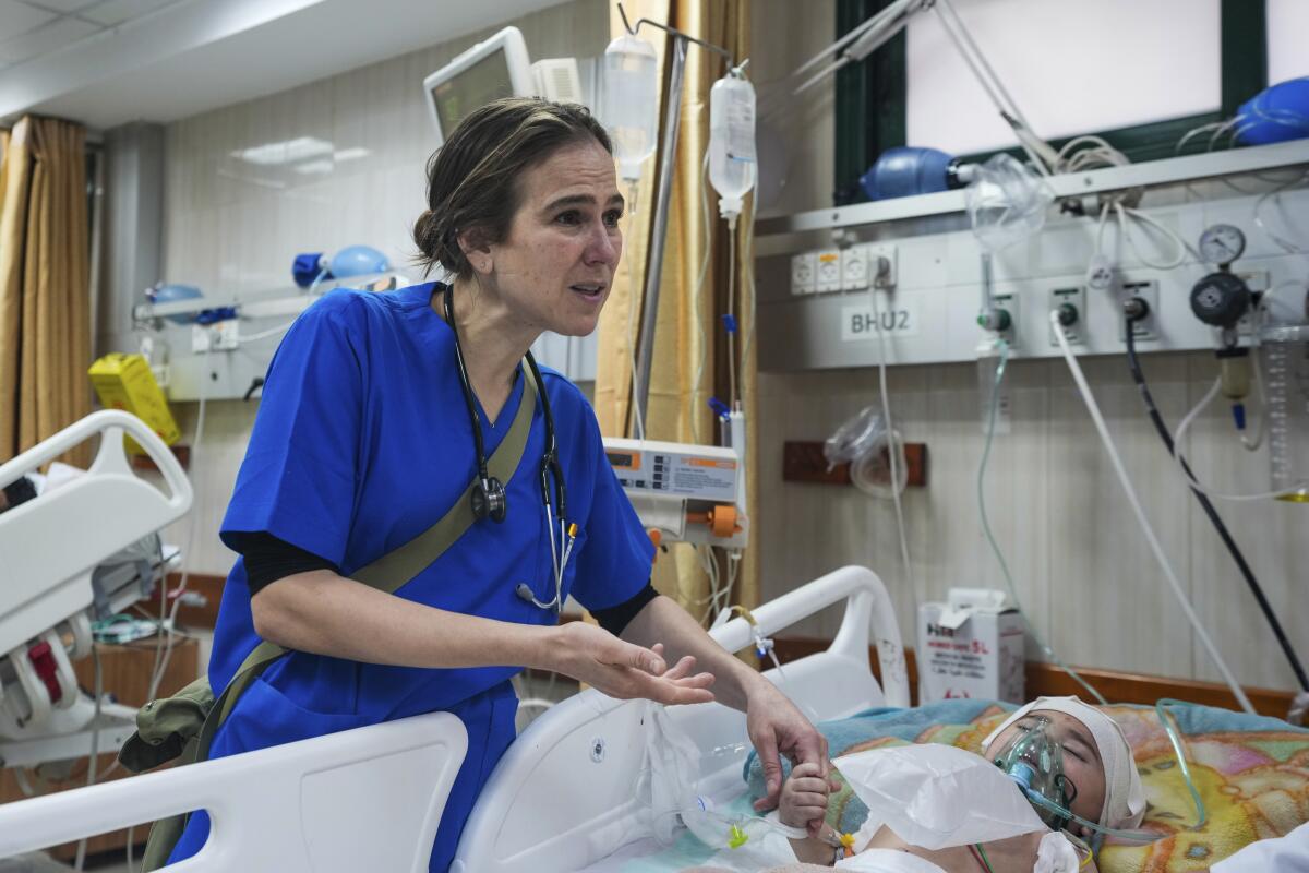 Pediatrician Tanya Haj-Hassan examines a wounded Gazan child.