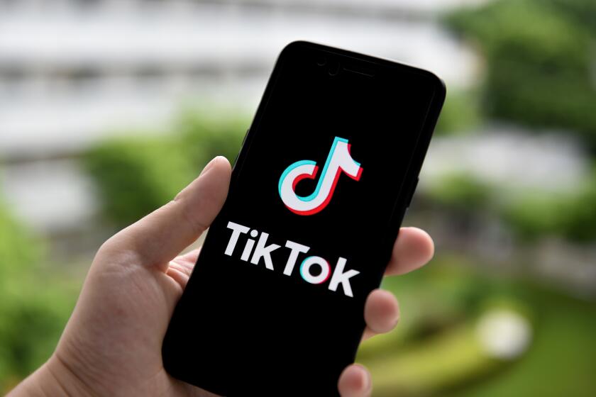 CHINA - 2020/09/14: In this photo illustration a TikTok logo is seen displayed on a smartphone. (Photo Illustration by Sheldon Cooper/SOPA Images/LightRocket via Getty Images)