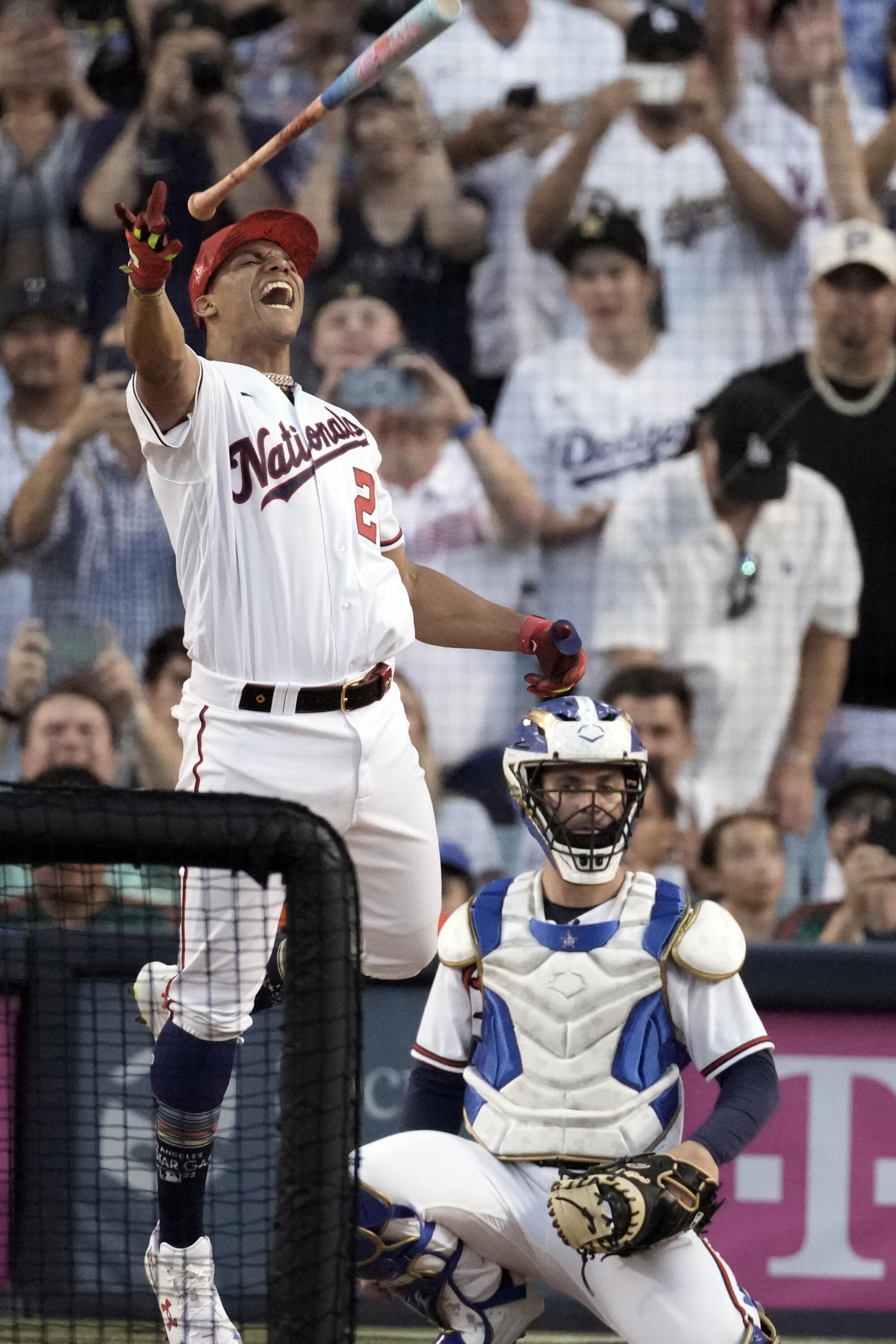 National League's Juan Soto celebrates after hitting a home run to win the MLB All-Star baseball Home Run Derby