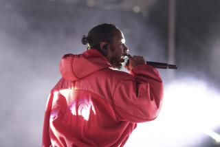 Kendrick Lamar performs at L.A. LIVE's Microsoft Square during NBA All Star Weekend 2018 on Friday, Feb. 17, 2018, in Los Angeles. (Photo by Richard Shotwell/Invision/AP)
