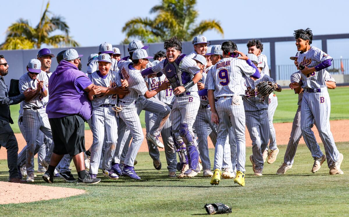 Bell players celebrate their 1-0 win over Granada Hills in the City Section Open Division semifinals at Pepperdine.