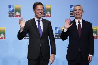 FILE - NATO Secretary General Jens Stoltenberg, right, greets Netherland's Prime Minister Mark Rutte during arrivals for a NATO summit in Vilnius, Lithuania, Tuesday, July 11, 2023. NATO on Wednesday, June 26, 2024 appointed Mark Rutte as its next secretary-general, putting the outgoing Dutch prime minister in charge of the world's biggest security organization at a critical time for European security as war rages in Ukraine. (AP Photo/Pavel Golovkin, File)