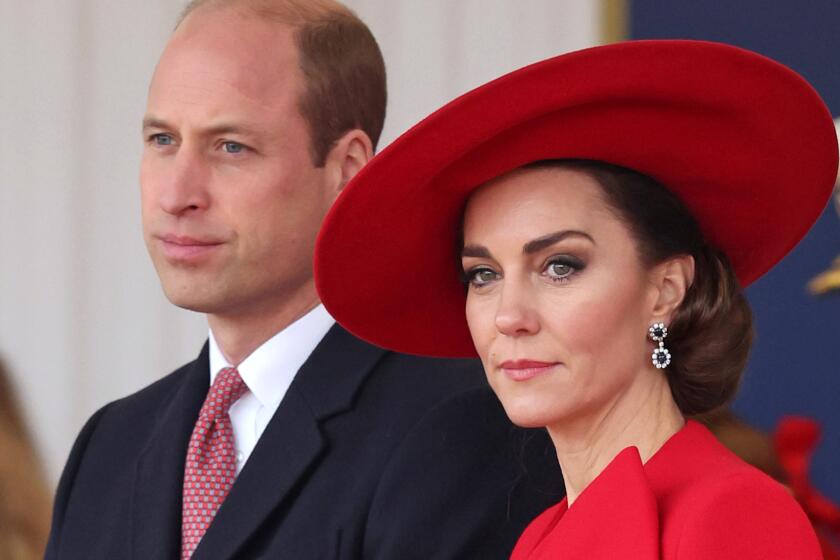 Britain's Prince William, left, and Britain's Kate, Princess of Wales, Nov. 21, 2023.