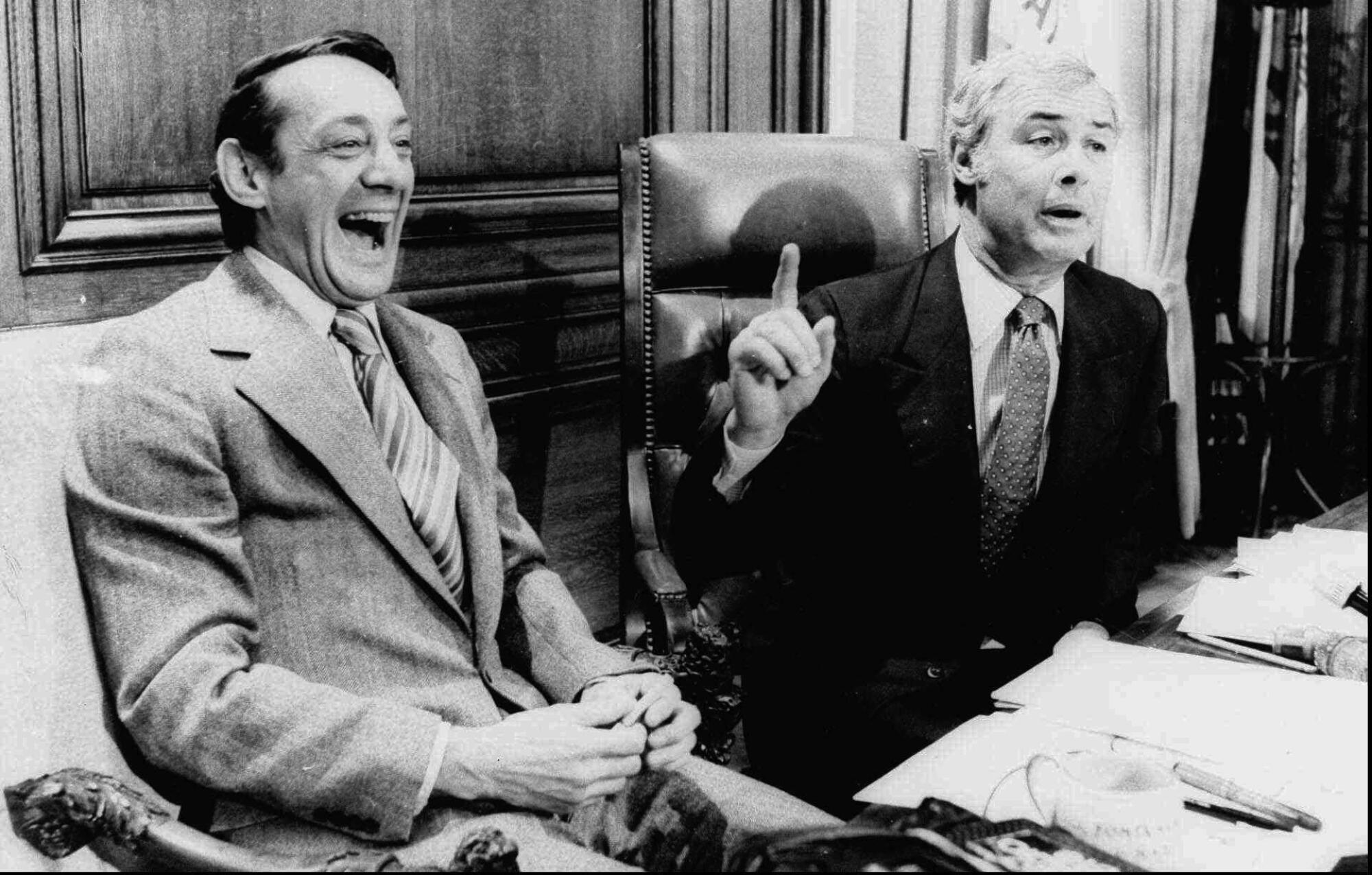 April 1977 photo of San Francisco Supervisor Harvey Milk, left, and Mayor George Moscone.