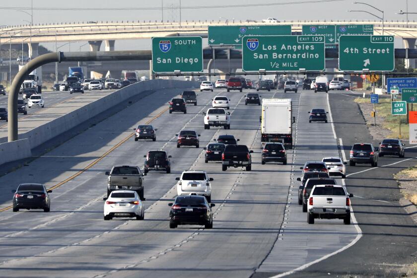 ONTARIO, CA. MAY 8, 2020 - View of the Friday morning commute on the 15 Freeway south just north of the 10 Freeway interchange in Ontario, May 8, 2020. (Irfan Khan / Los Angeles Times)