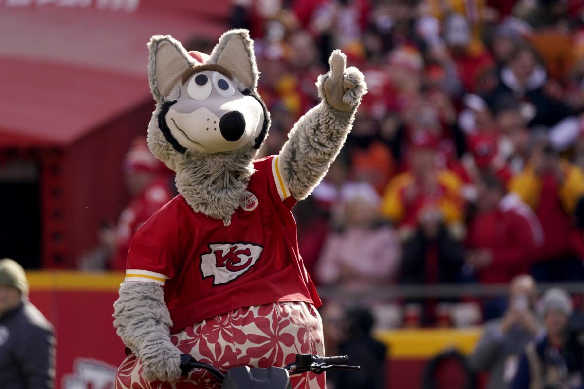 Kansas City Chiefs mascot KC Wolf motivates fans during the first half of the AFC championship NFL football game