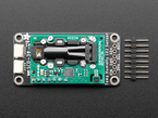 Adafruit SCD-30 - NDIR CO2 Temperature and Humidity Sensor with tan STEMMA QT connectors next to a 6-pin header. 