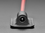 Close-up of sewable DC jack connector.