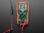 Multimeter demo with sewable connector, showing 5V.