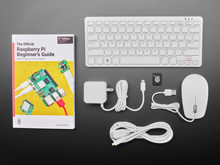 Computer kit contents, including keyboard, mouse, SD card, USB HDMI cable, power cable, and book.