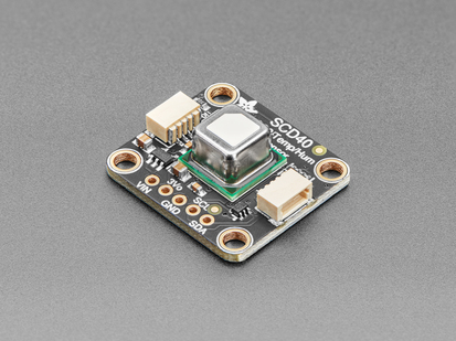 Angled shot of Adafruit SCD-40 - NDIR CO2 Temperature and Humidity Sensor.