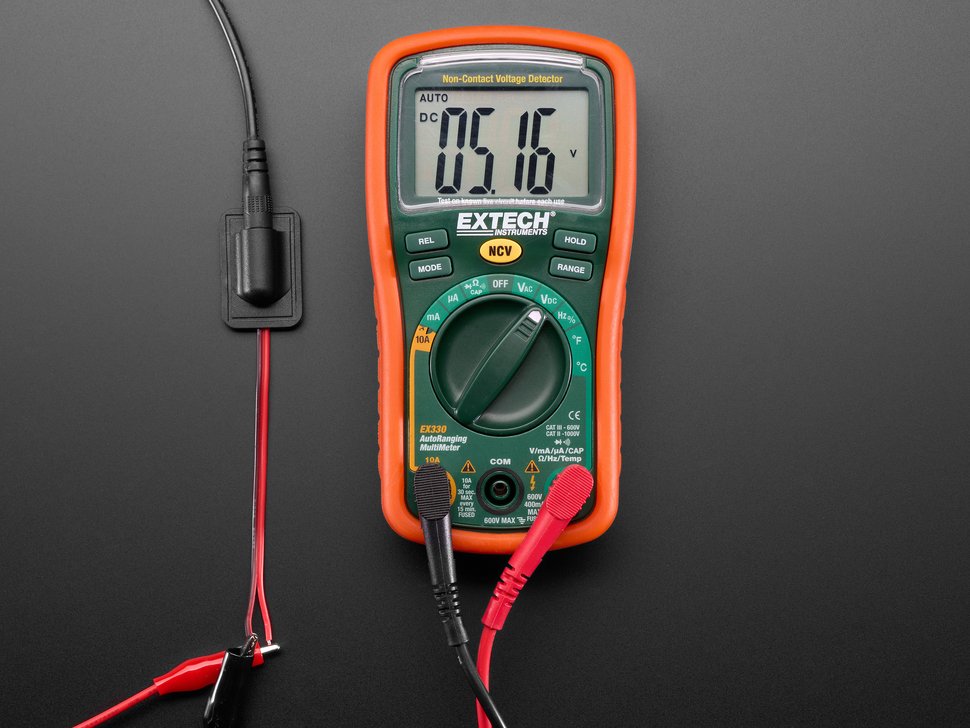 Multimeter demo with sewable connector, showing 5V.