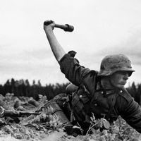 Operation Barbarossa, German troops in Russia, 1941. Nazi German soldiers in action against the Red Army (Soviet Union) at an along the frontlines in the early days of the German invasion of the Soviet Union, 1941. World War II, WWII